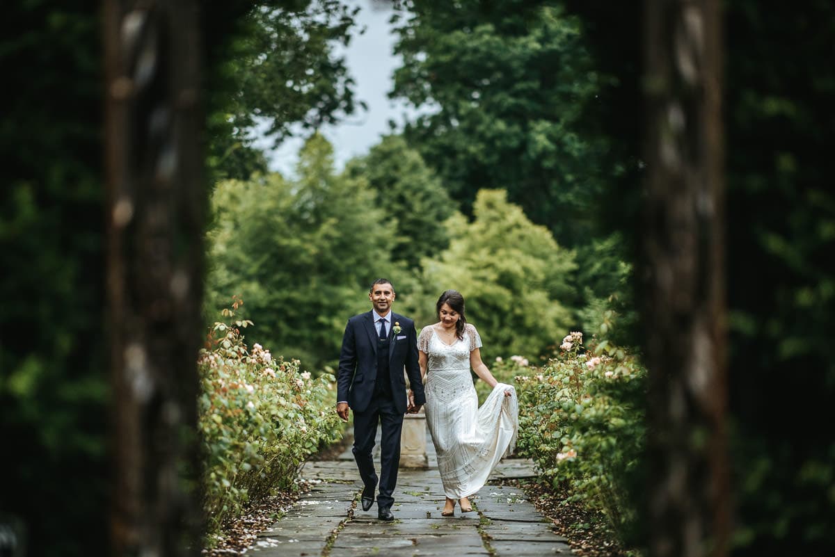 tipi wedding berkshire bride and groom walking