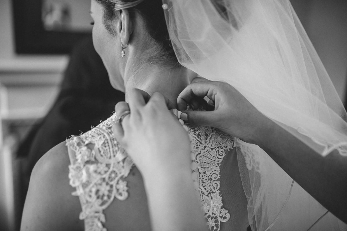 norton park wedding getting ready doing up the dress