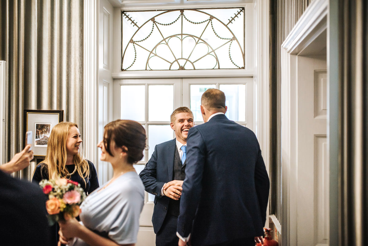 winchester wedding guest laughing