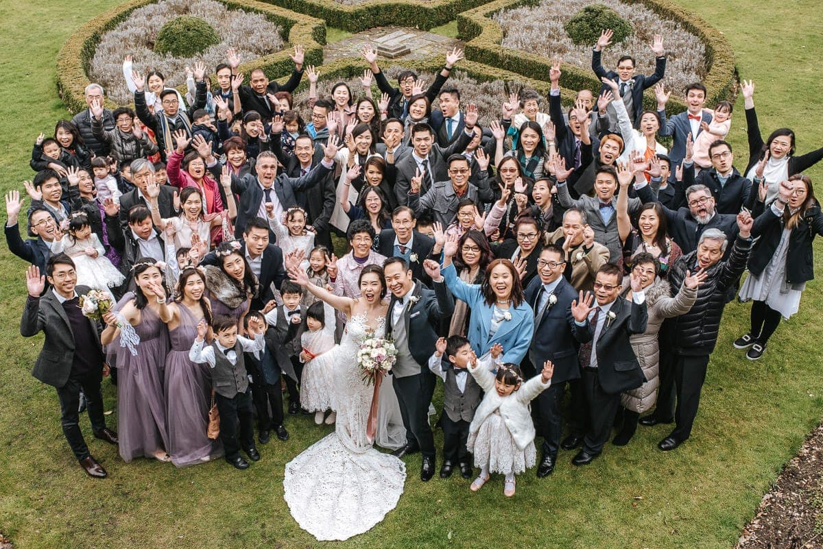 chinese wedding london hall place bexley bride and groom group shot