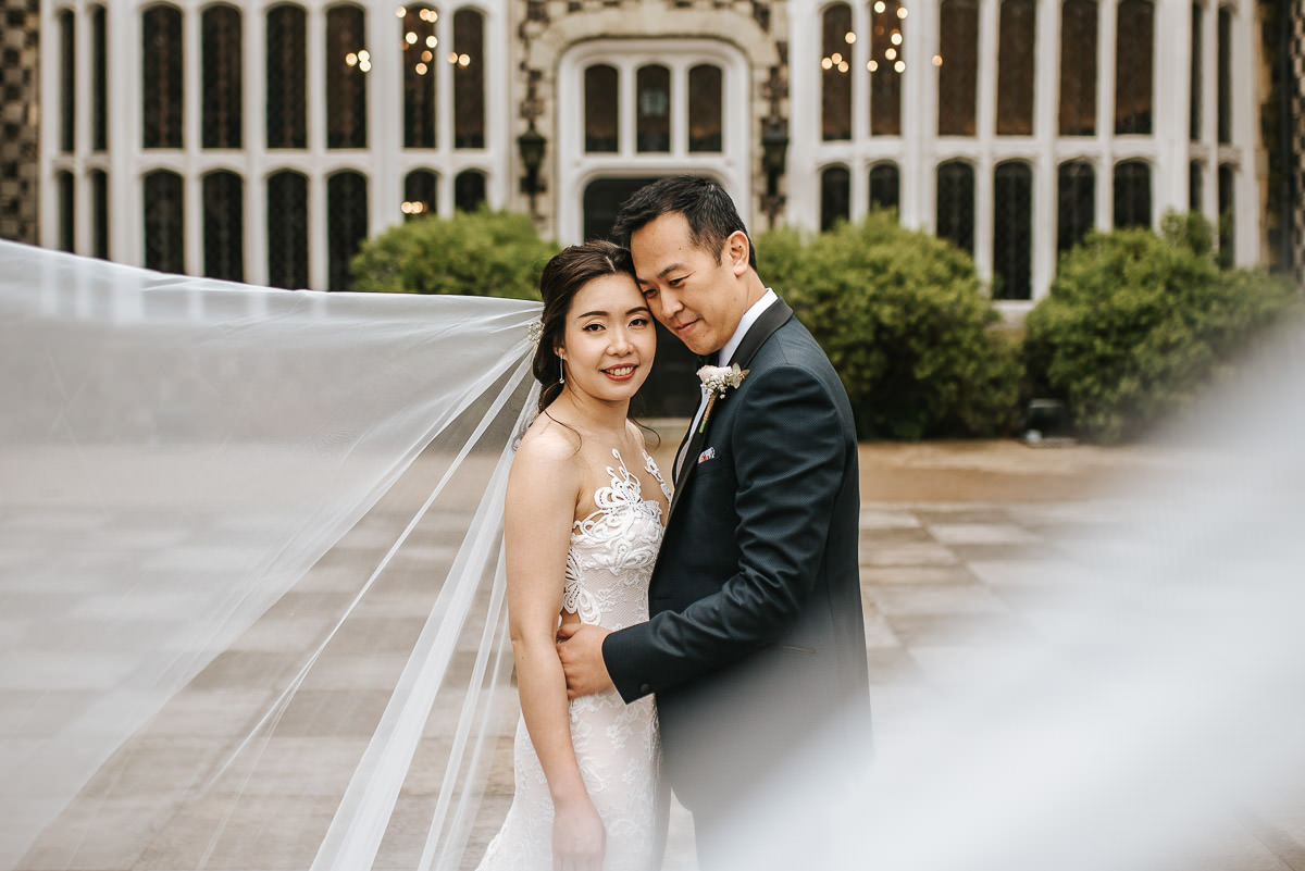 chinese wedding london hall place bexley bride and groom veil shot
