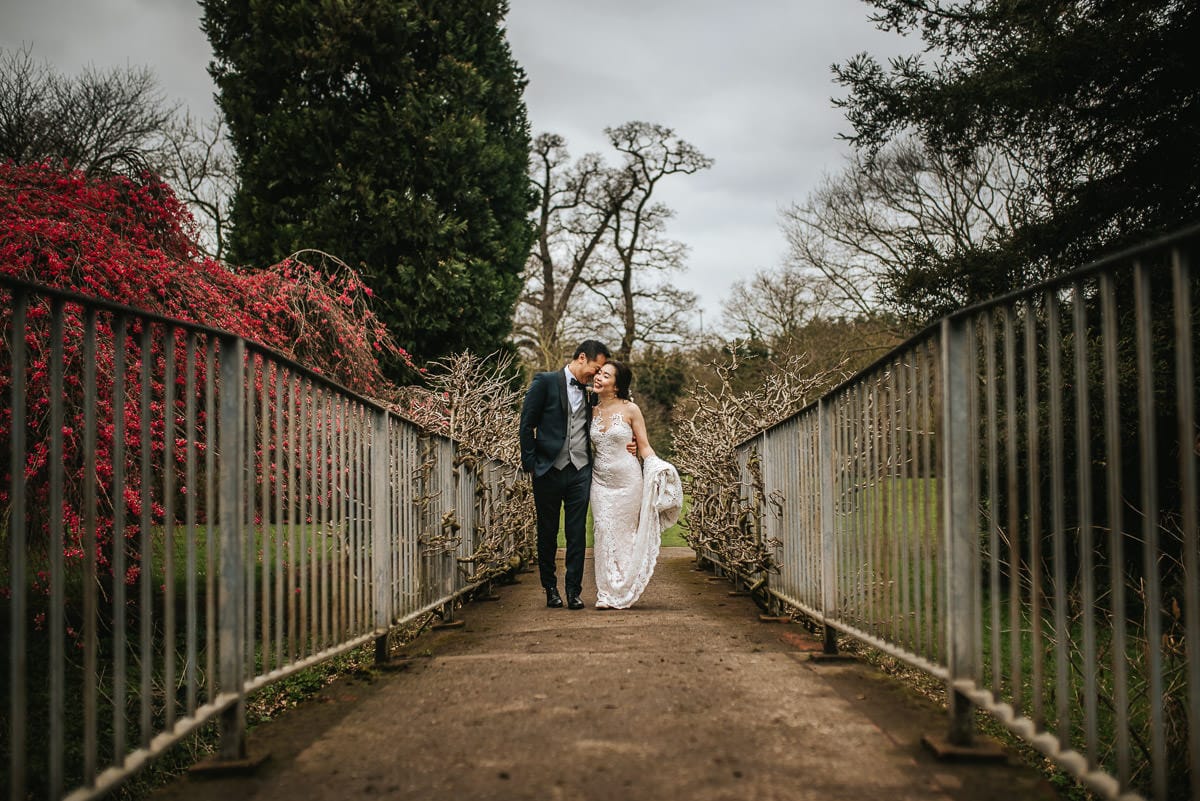 chinese wedding london hall place bexley bride and groom on the bridge
