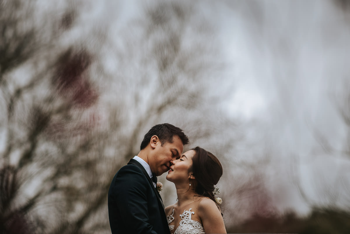 chinese wedding london hall place bexley bride and groom kiss