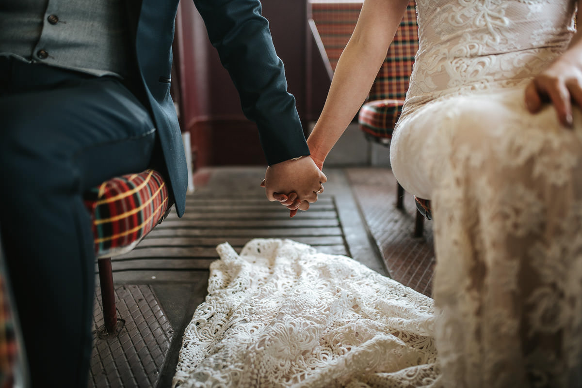 chinese wedding london hall place holding hands