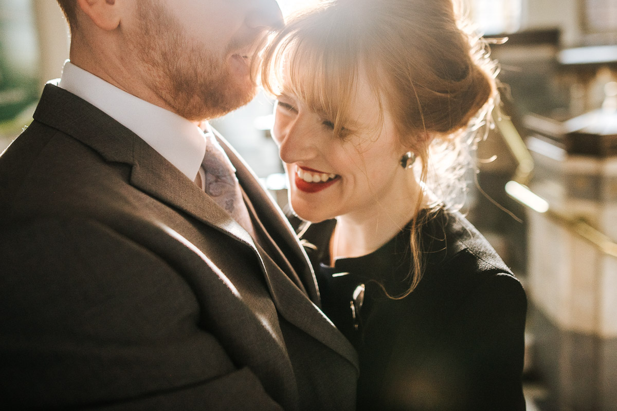 islington town hall wedding couple having a sweet moment