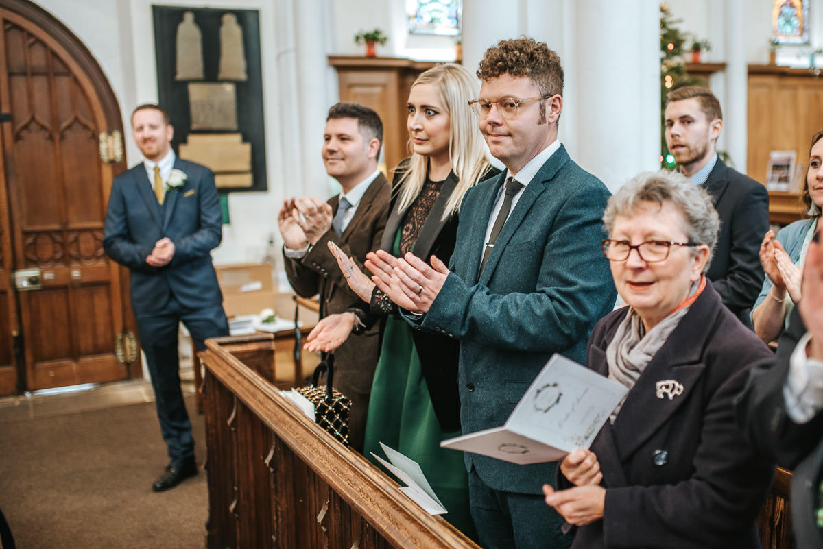 hertfordshire wedding photos ceremony guests clapping