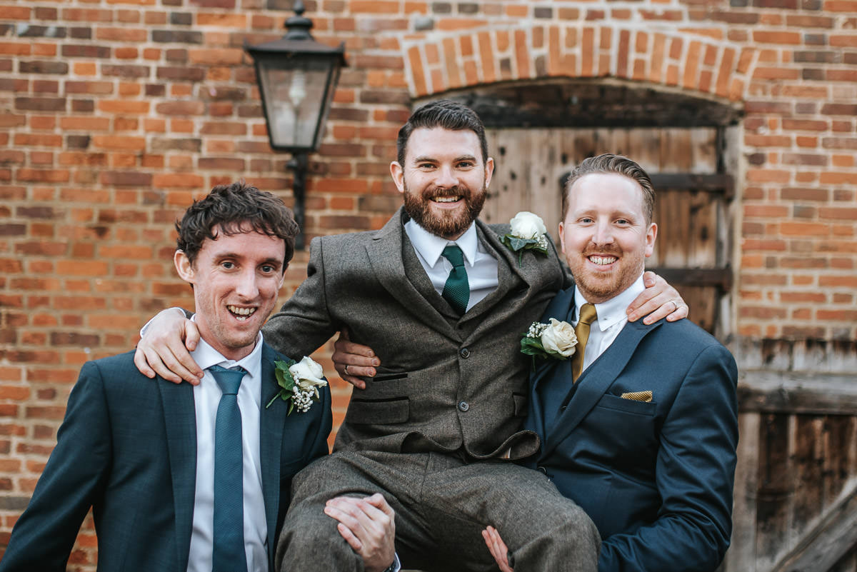 tewin bury farm wedding groom and groomsmen
