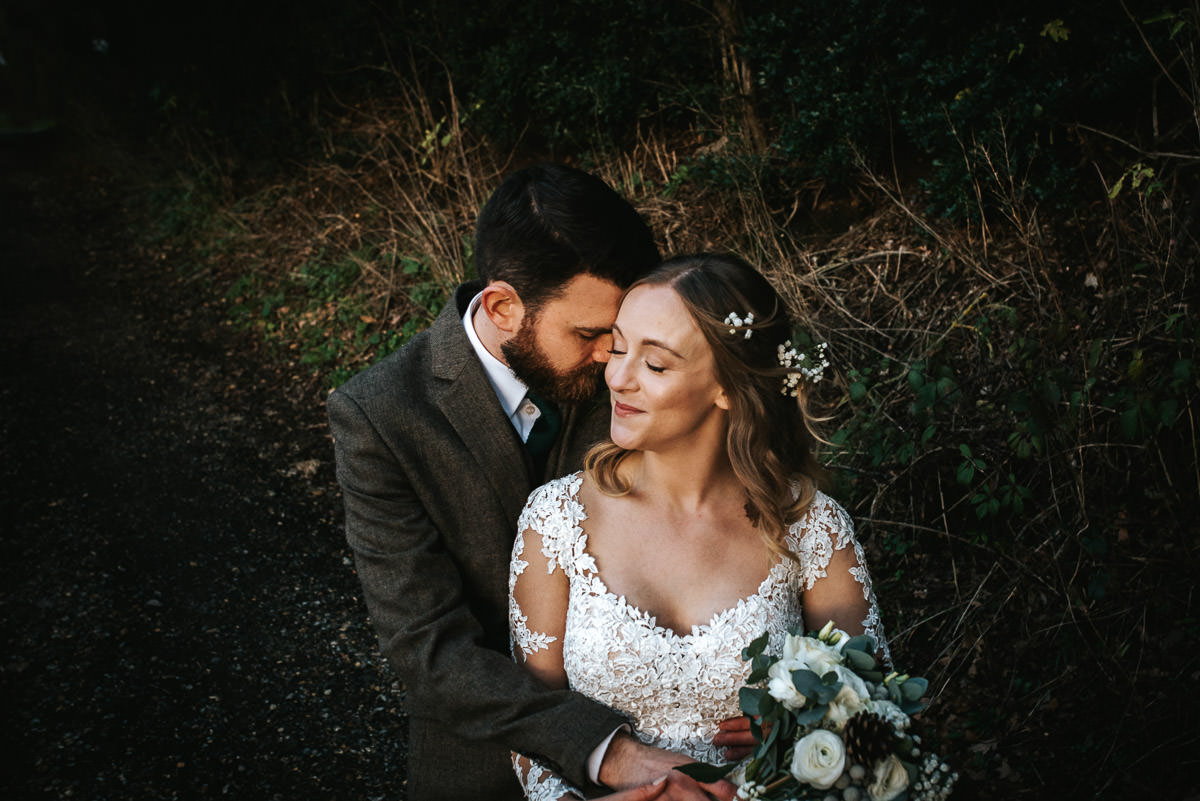 tewin bury farm wedding couple shoot embracing
