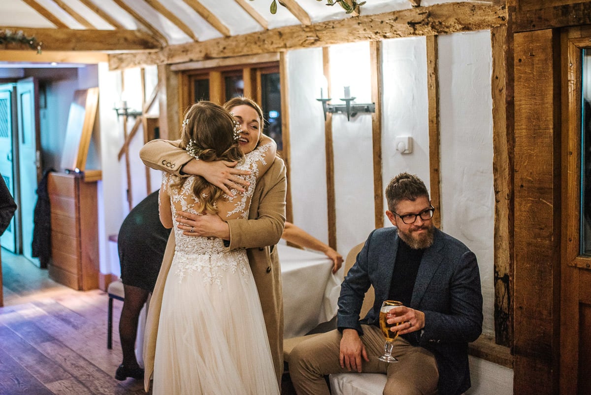 tewin bury farm wedding hugs