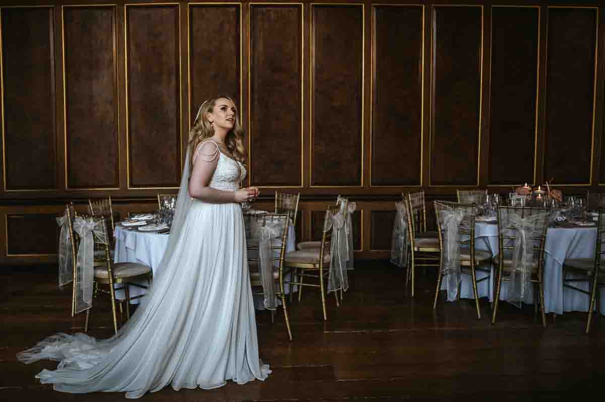 gosfield hall wedding bride checking the breakfast room