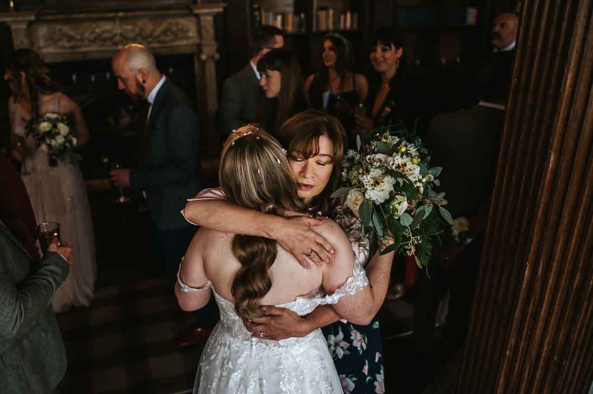 gosfield hall wedding couple receiving guests