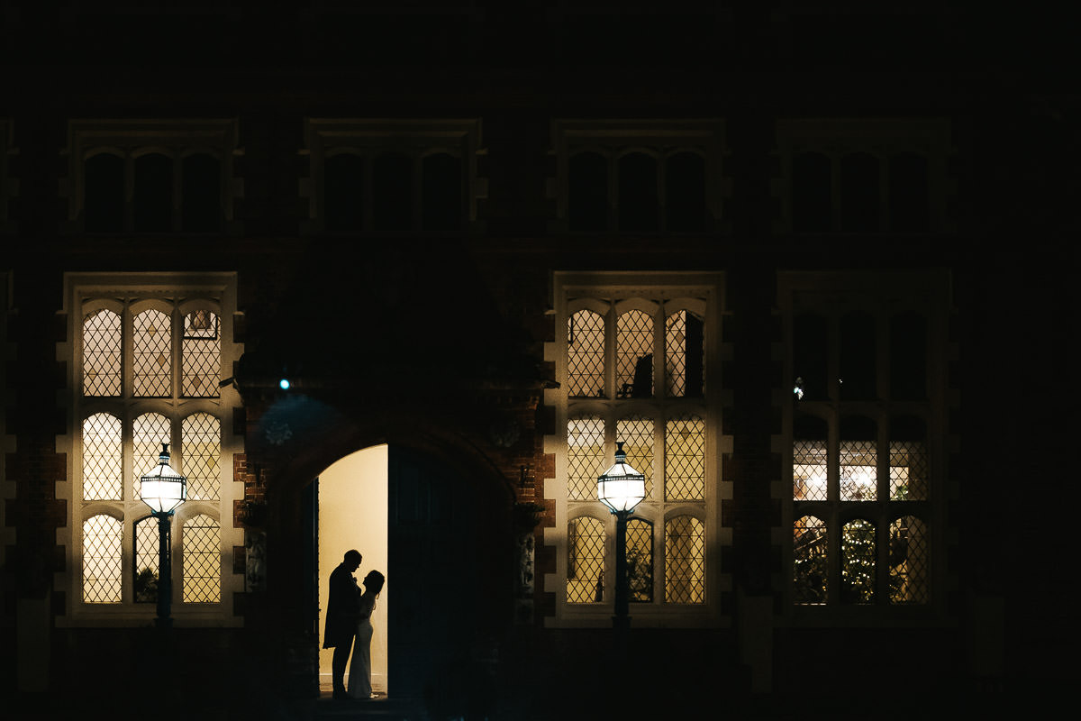 gosfield hall wedding bride and groom in the rain