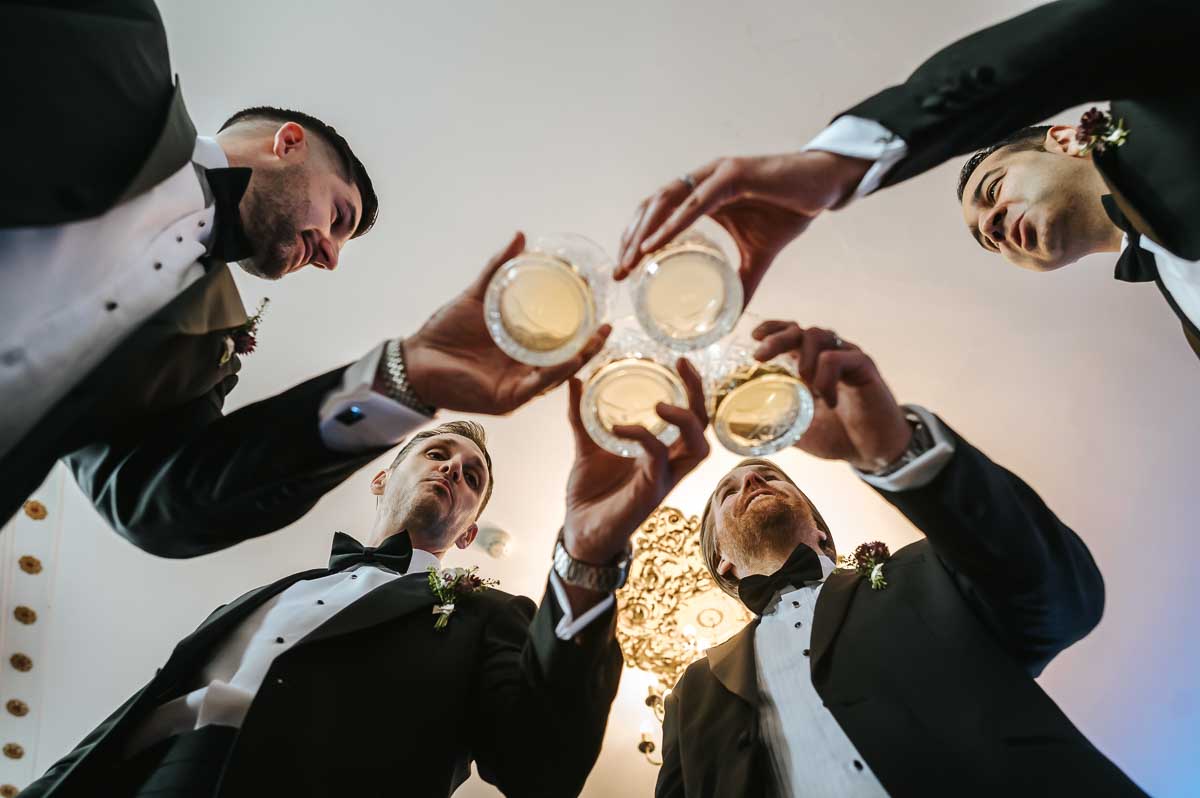 gosfield hall wedding groom toasting