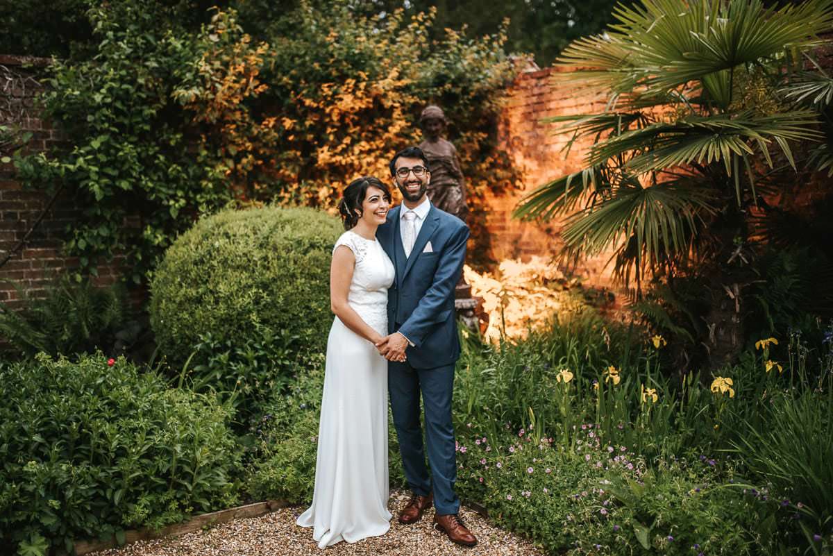 northbrook park indian wedding bride and groom together hugging