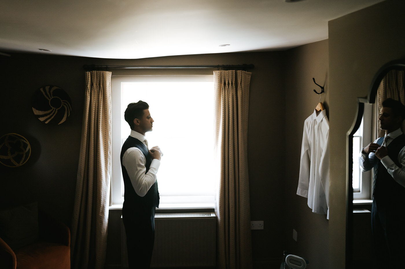 braxted park wedding photography groom getting ready