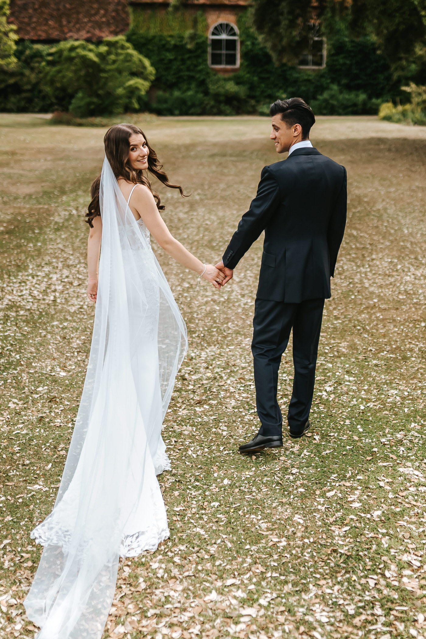braxted park wedding couple portraits back of the dress