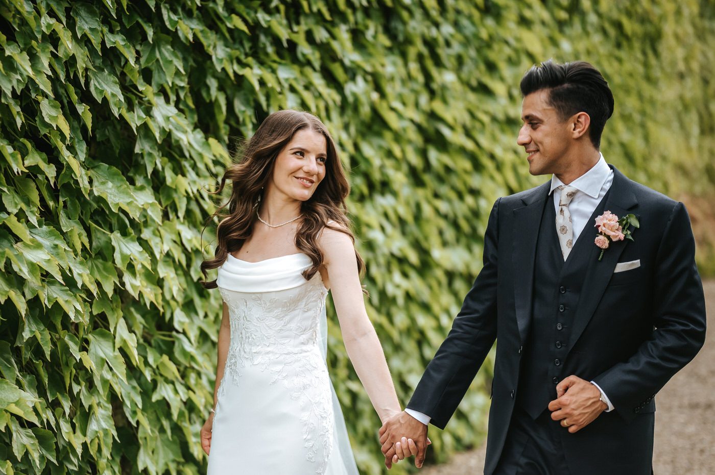 braxted park wedding couple portraits bridr walking