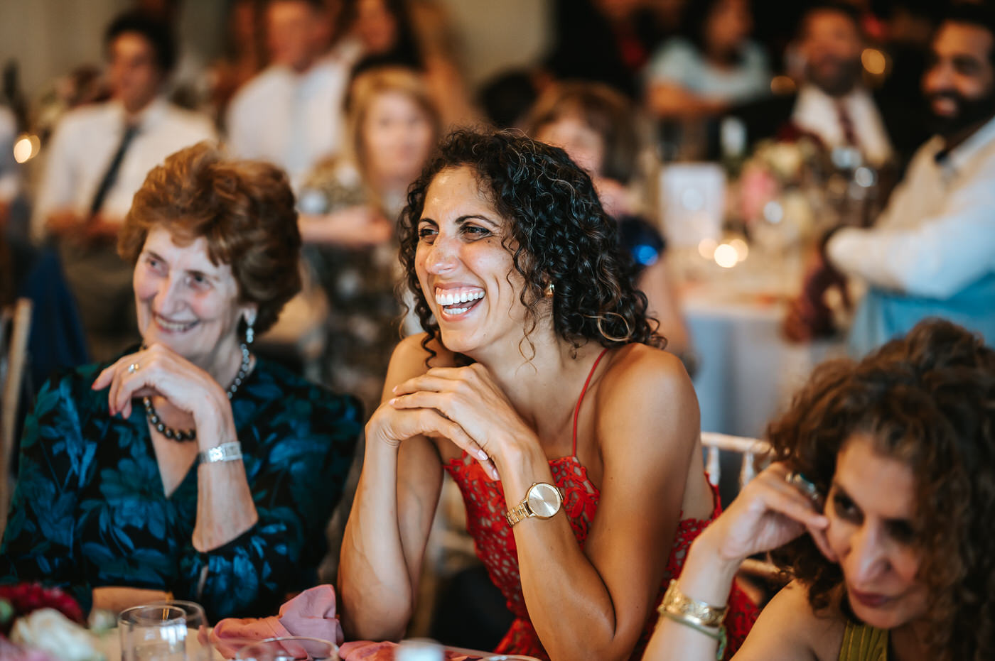braxted park wedding guests laughing
