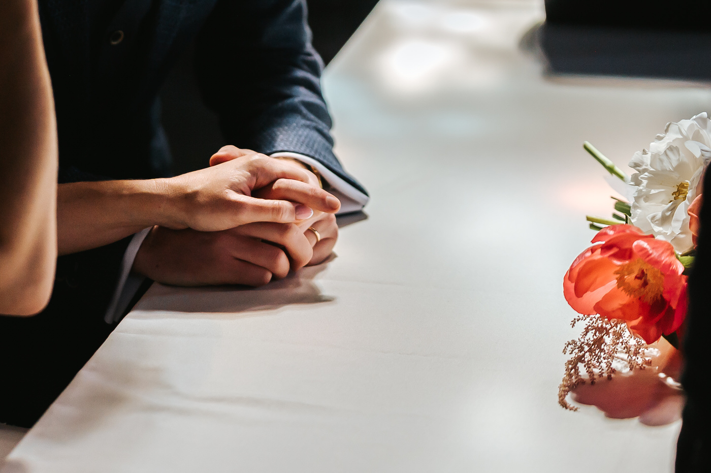 asylum chapel wedding close up on bride and groom's hands