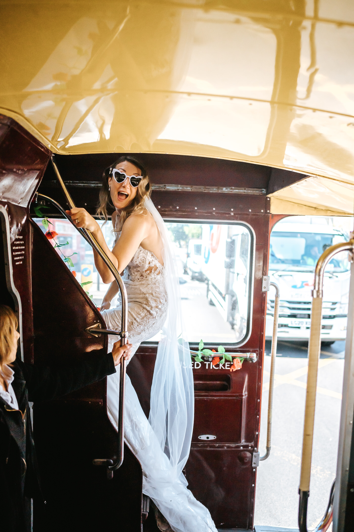 asylum chapel wedding bride walik up the steps in wedding bus