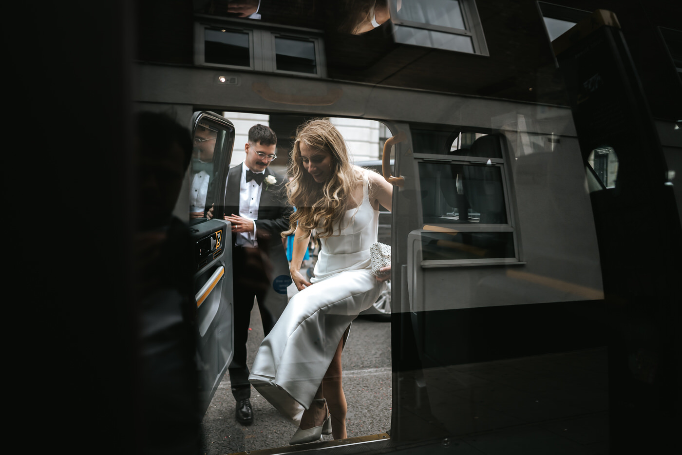 Camden Town Hall wedding bride entering a taxi