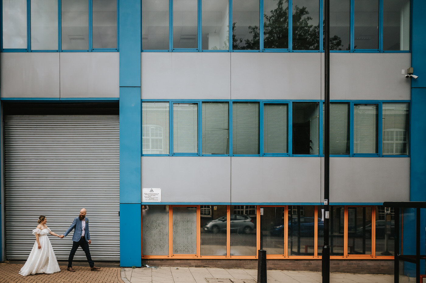 depot wedding couple walking ouside the depot