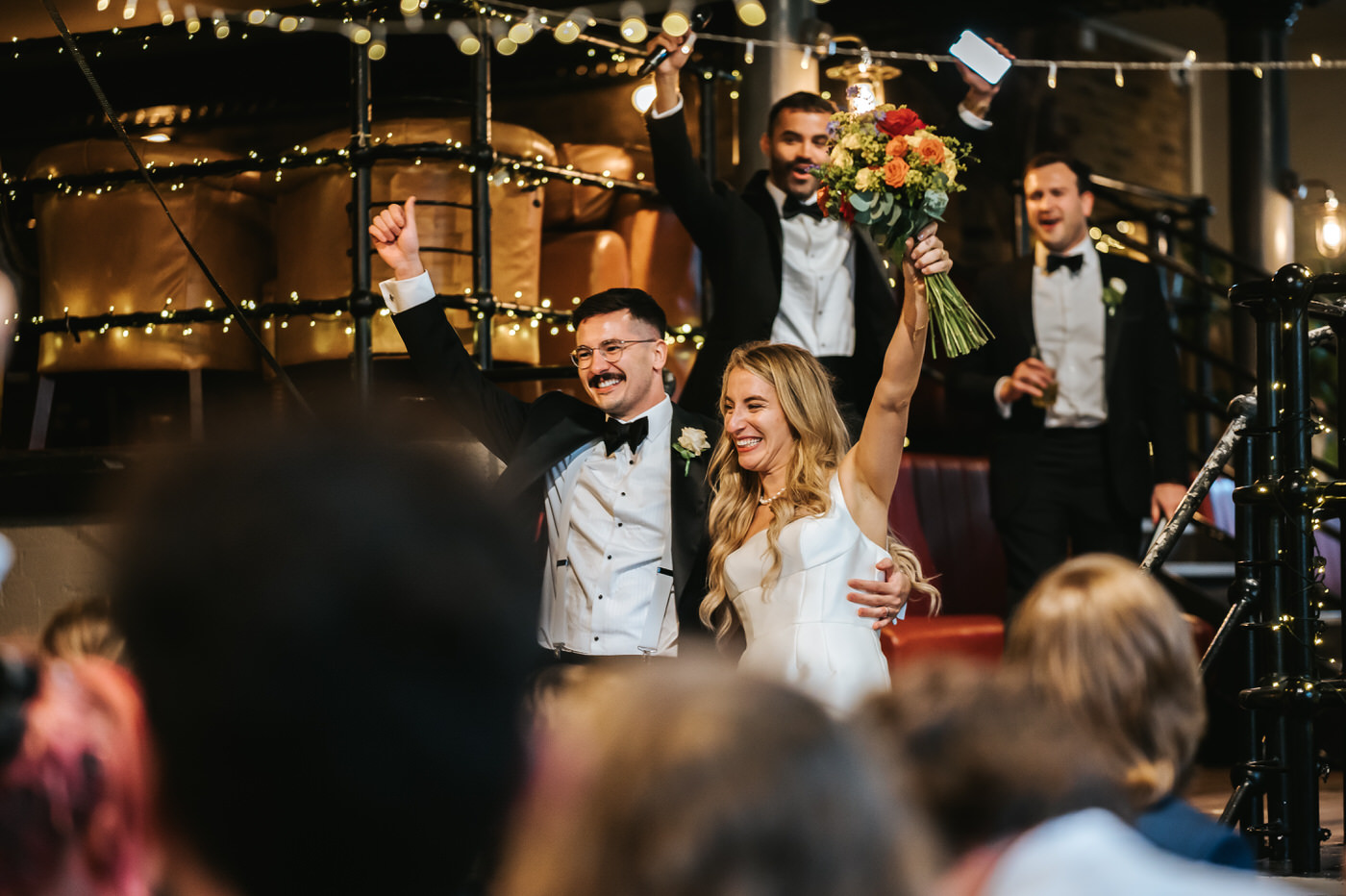 depot wedding newlyeds cheering