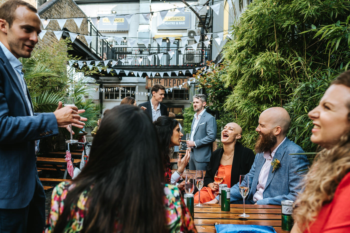 depot n7 wedding guest mingling outside