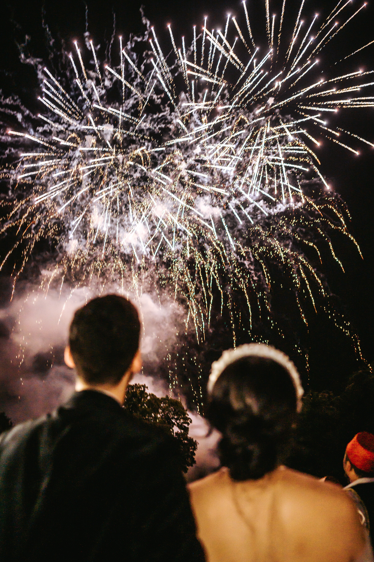ashridge house wedding bride and groom looking at firework display