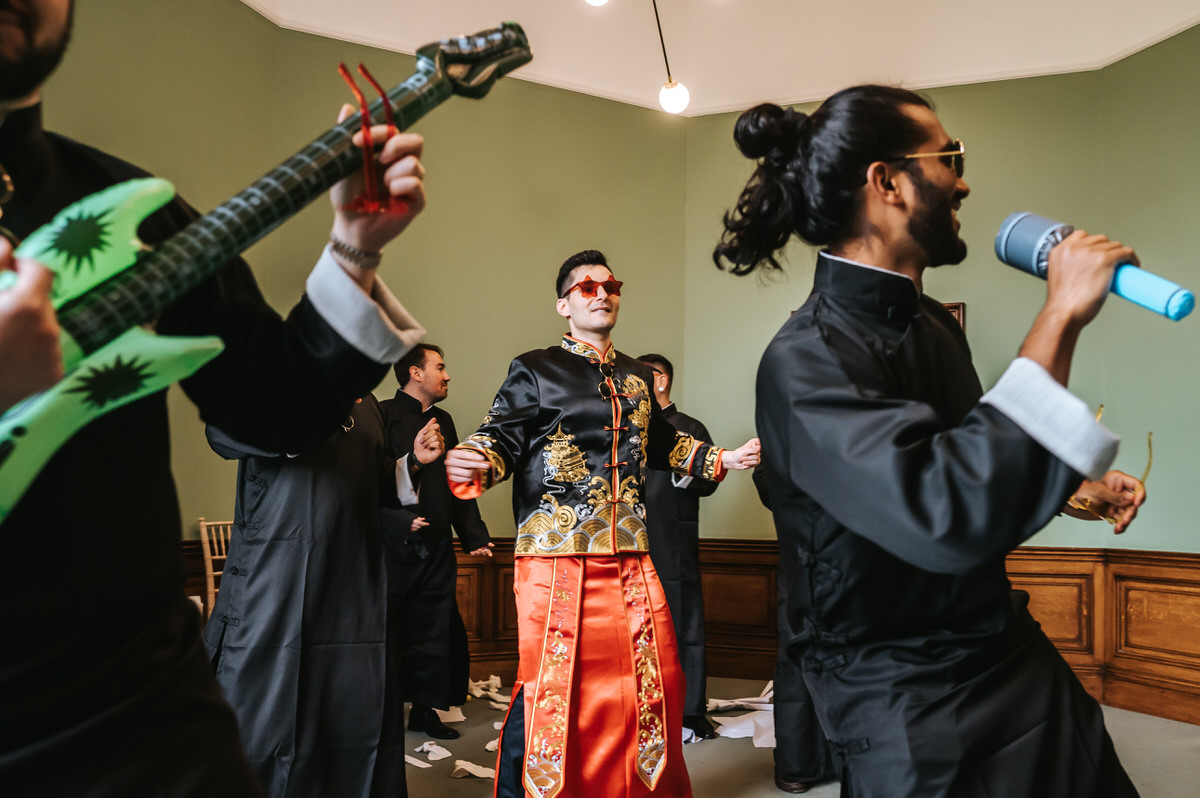 ashridge house wedding groom dancing with his groomsmen