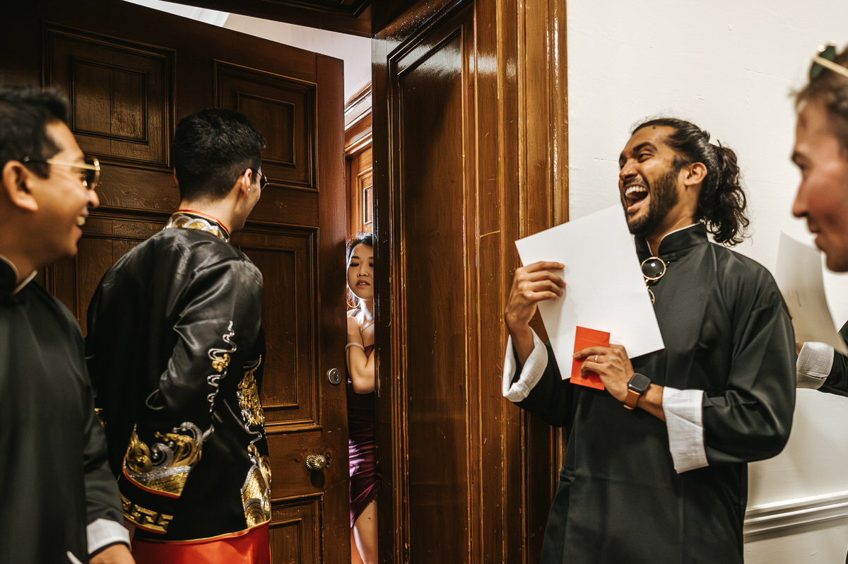 ashridge house wedding groomsmen laughing