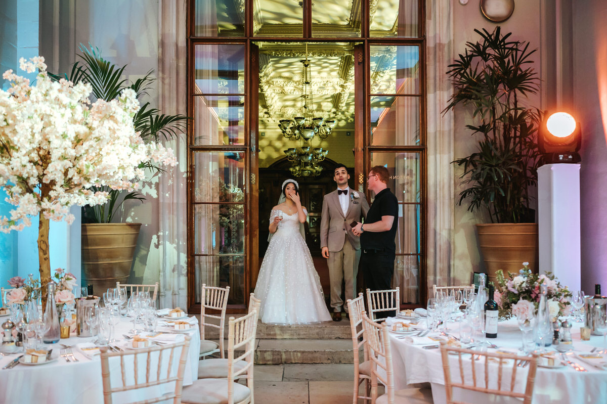 ashridge house wedding bride and groom walking into the breakfast room
