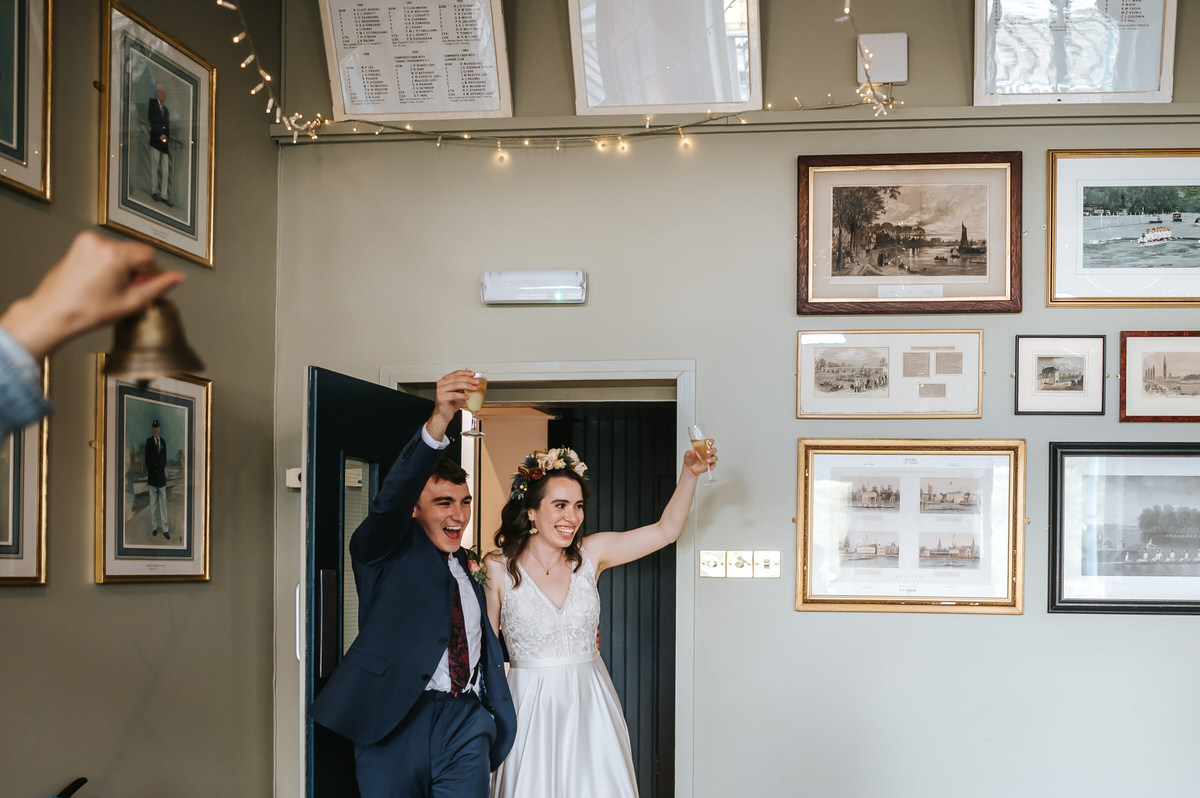london rowing club wedding bride and groom entering the room